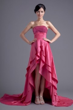 Robe de bal empire bustier courte devant longue derrière à volants